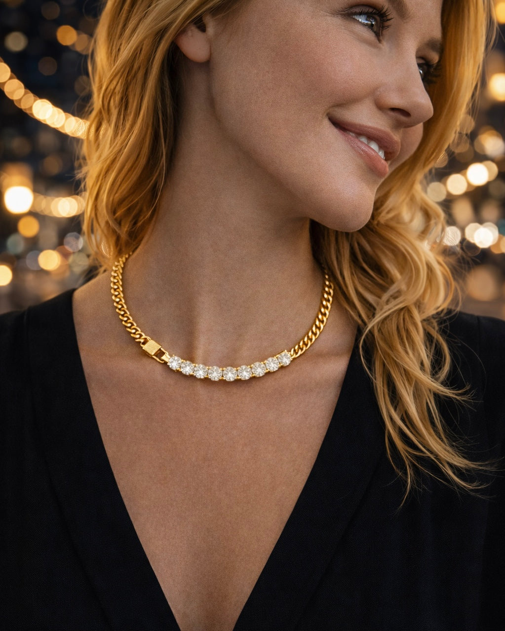 The Icon chain a small gold Cuban chain with diamond like accent stones on a model in the city lights