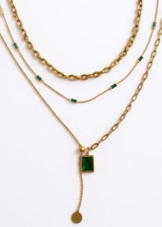 Deep green gem, bright gold chain, necklace stack, stacked necklace, multiple gold chains