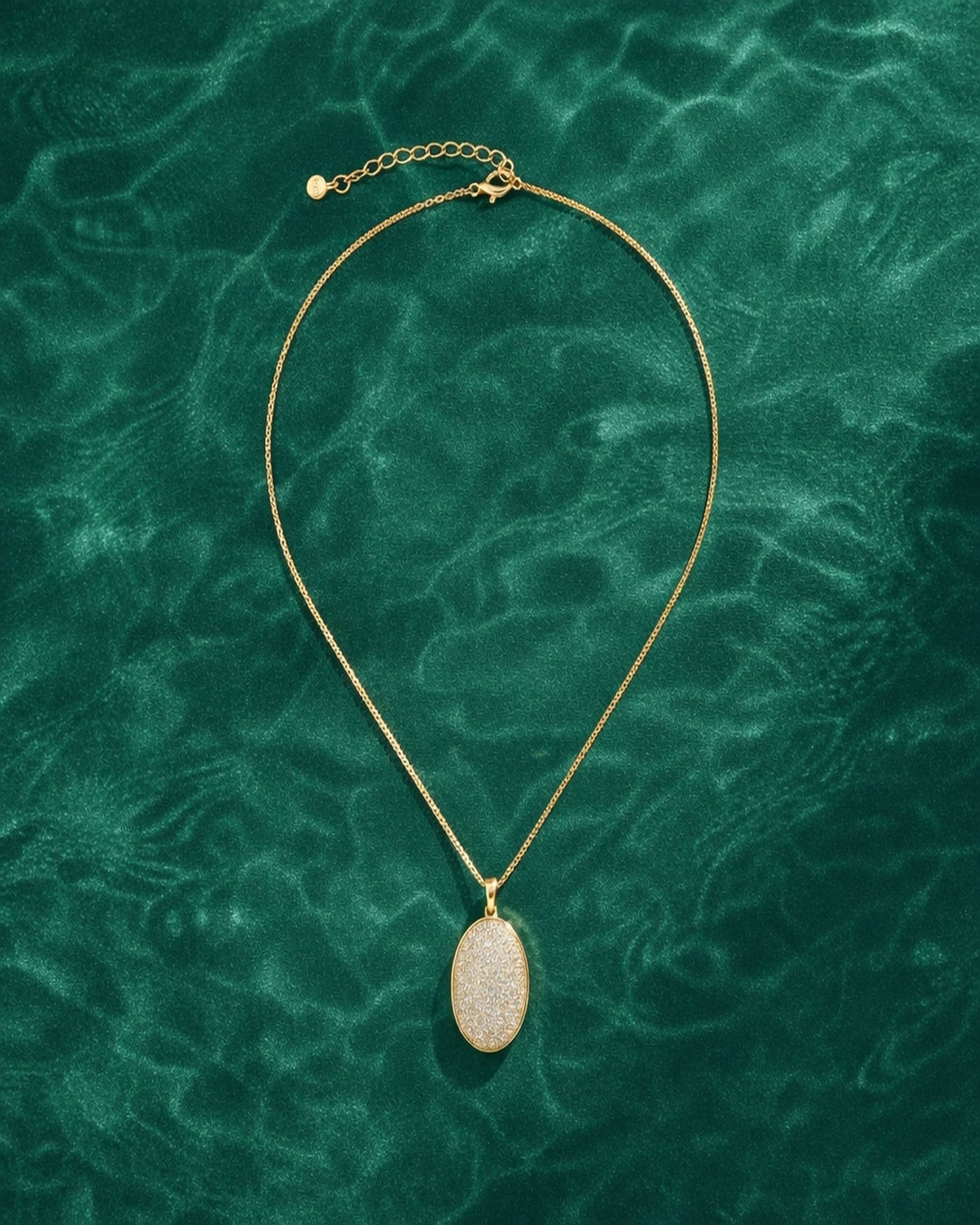 The Lumina Pendant gold sparkle pendant necklace close-up